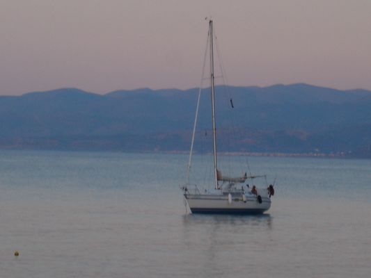 Yacht in twilight near Chersonissos. 